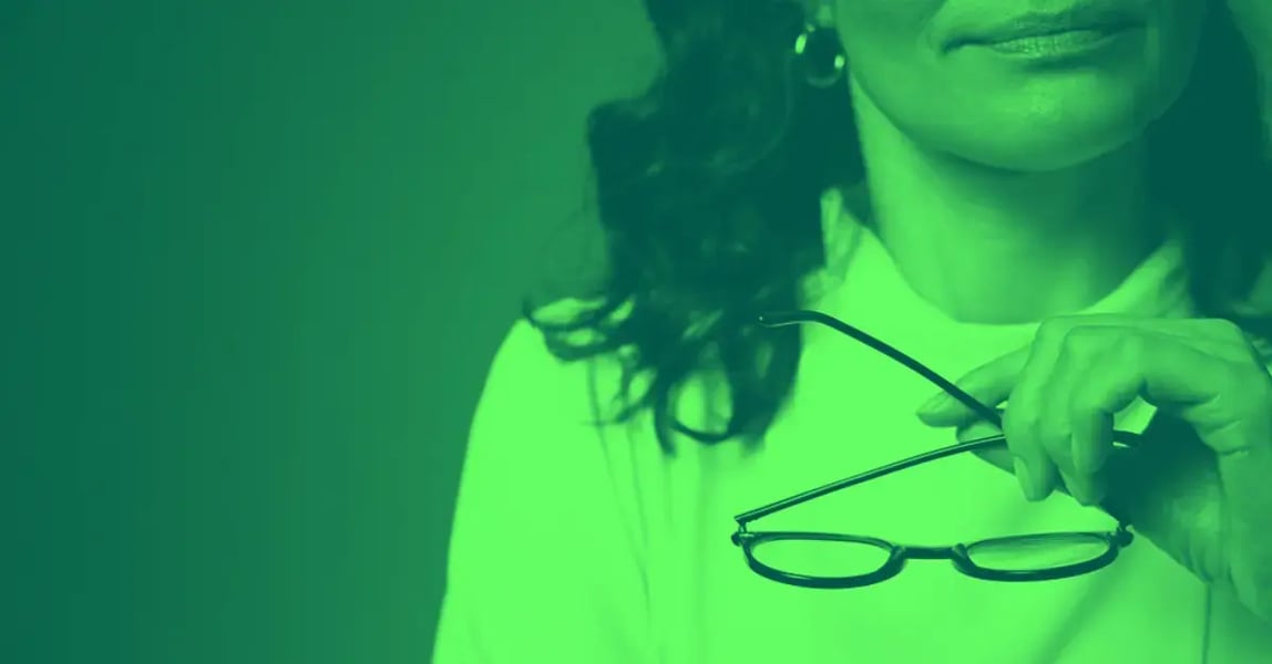 woman holding glasses
