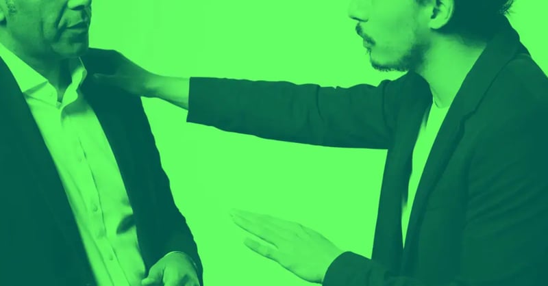 Two men: A boss talking two an employee